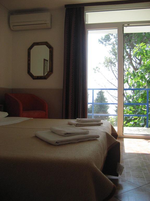 Adria Beach Guest House Нови-Винодолски Номер фото